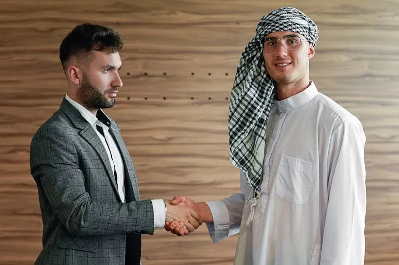 Business handshake between professionals in Saudi Arabia