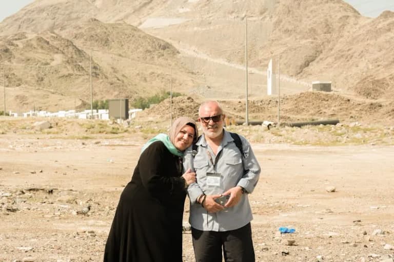 Couple in the Saudi Arabian desert