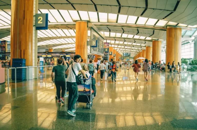 Indian family at the airport preparing for travel