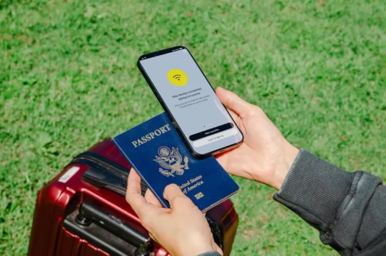 American passport with travel suitcase