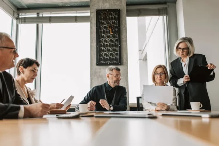 Business professionals in a modern office meeting