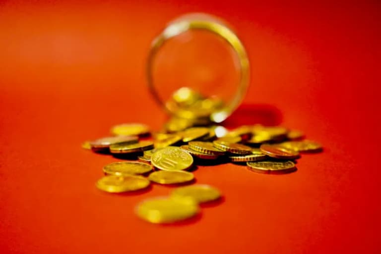 Gold coins representing wealth and zakat calculation